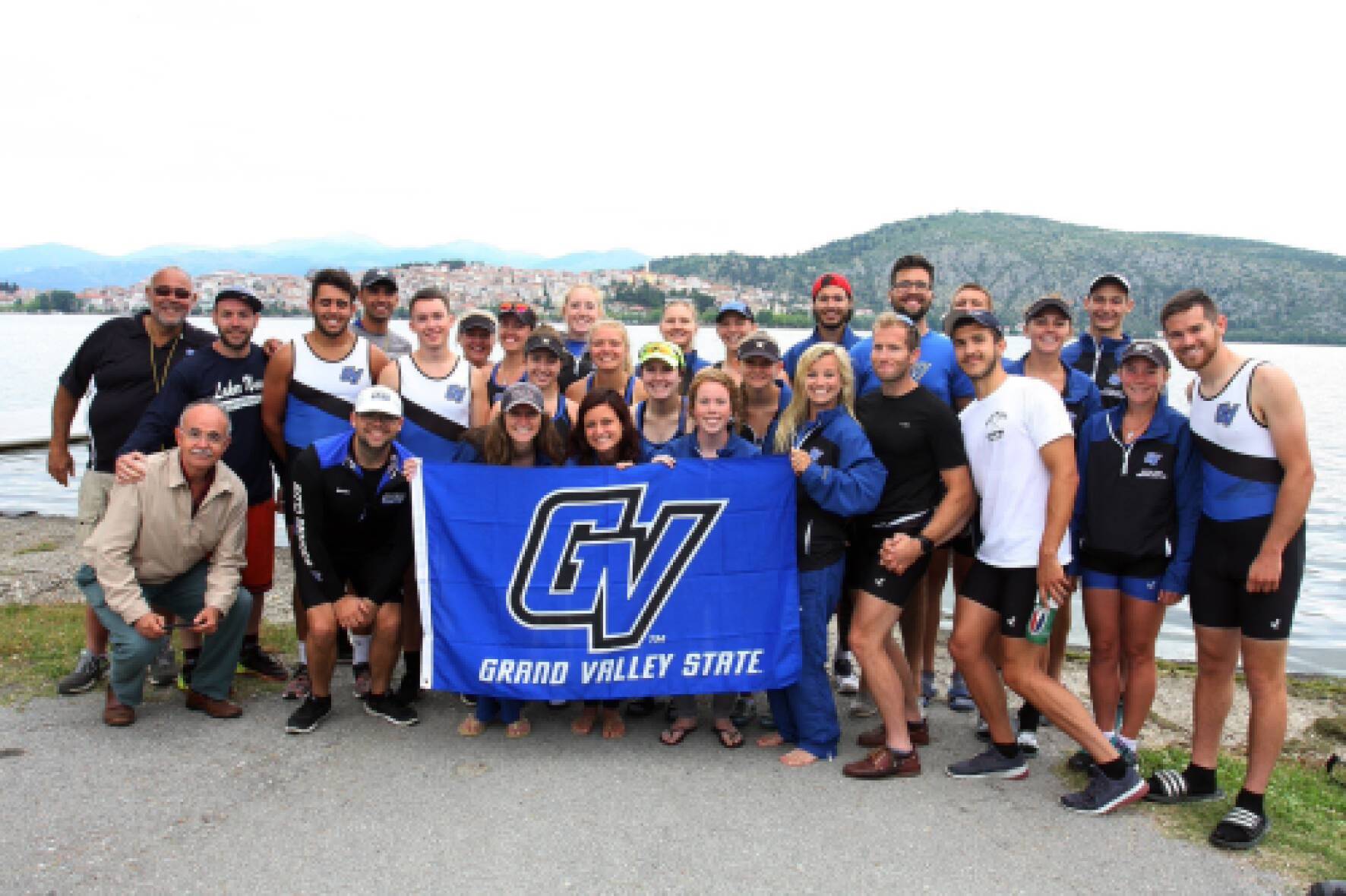Rowing pose for photo on trip to Greece